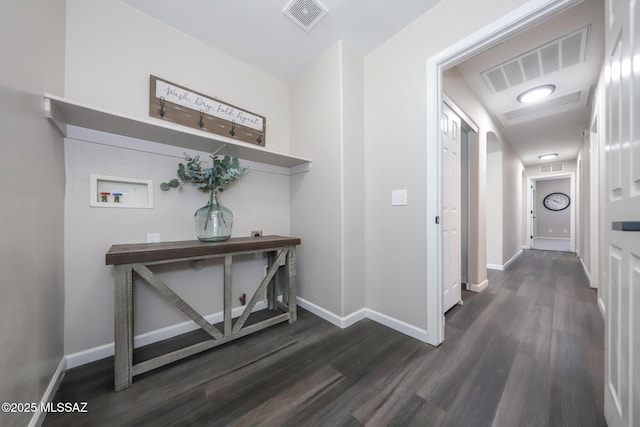 Tucson, AZ 85748 - hallway with dark wood-type flooring and baseboards