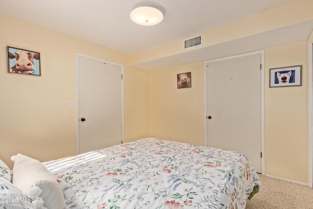 134 S Paseo Quinta Unit A, Green Valley, AZ 85614 - carpeted bedroom featuring a closet and baseboards