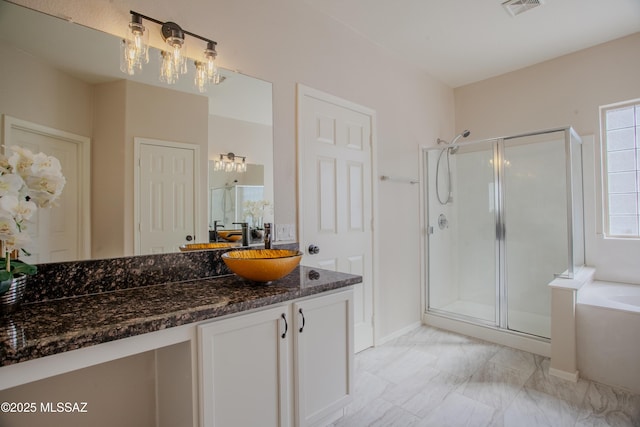 7663 W Creosote Spring Ct, Tucson, AZ 85743 - full bath featuring a stall shower, vanity, a bath, and marble look tiles
