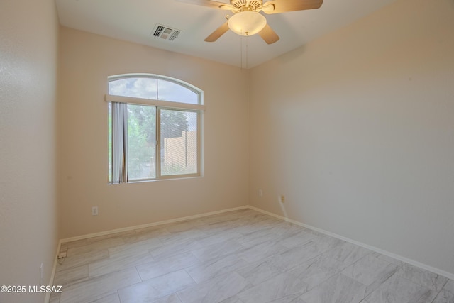 7663 W Creosote Spring Ct, Tucson, AZ 85743 - unfurnished room with a ceiling fan and baseboards