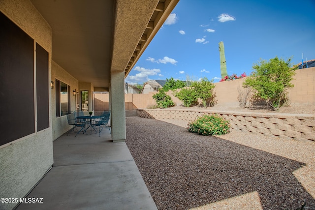 7663 W Creosote Spring Ct, Tucson, AZ 85743 - fenced backyard with a patio