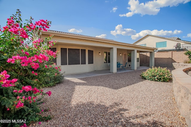 7663 W Creosote Spring Ct, Tucson, AZ 85743 - rear view of house featuring a patio area and stucco siding