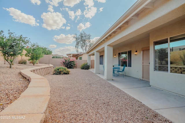 7663 W Creosote Spring Ct, Tucson, AZ 85743 - fenced backyard with a patio