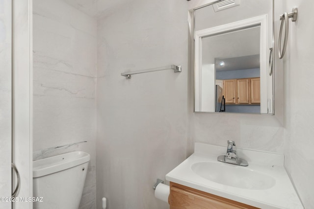 961 N Euclid Ave Unit 130, Tucson, AZ 85719 - half bathroom with toilet and vanity