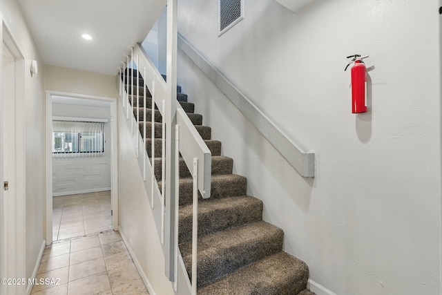 961 N Euclid Ave Unit 130, Tucson, AZ 85719 - stairway with tile patterned floors, recessed lighting, and baseboards