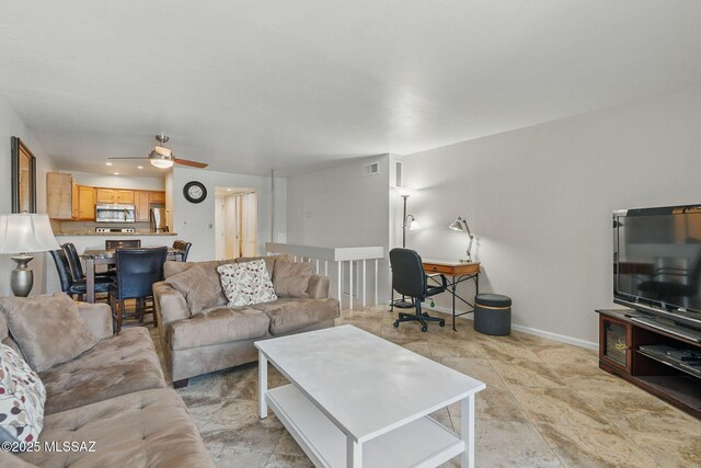 961 N Euclid Ave Unit 130, Tucson, AZ 85719 - living area with ceiling fan, baseboards, and an office area