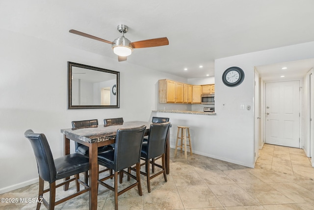 961 N Euclid Ave Unit 130, Tucson, AZ 85719 - dining space with baseboards, recessed lighting, ceiling fan, and light tile patterned flooring