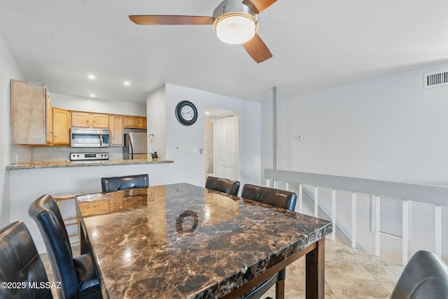 961 N Euclid Ave Unit 130, Tucson, AZ 85719 - dining space with a ceiling fan and recessed lighting