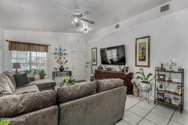 7157 W Odyssey Way, Tucson, AZ 85743 - living area with a ceiling fan, light tile patterned floors, and baseboards