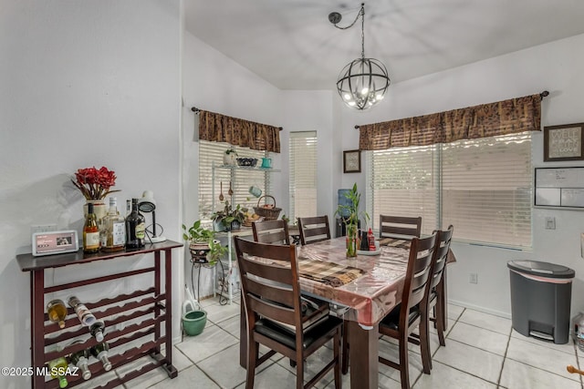 7157 W Odyssey Way, Tucson, AZ 85743 - dining area featuring light tile patterned floors and a chandelier