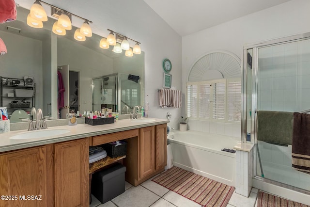 7157 W Odyssey Way, Tucson, AZ 85743 - full bathroom featuring tile patterned floors, a stall shower, double vanity, and a garden tub