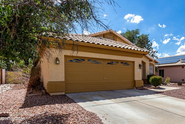 7157 W Odyssey Way, Tucson, AZ 85743 - view of front facade with stucco siding, driveway, an attached garage, and a tile roof