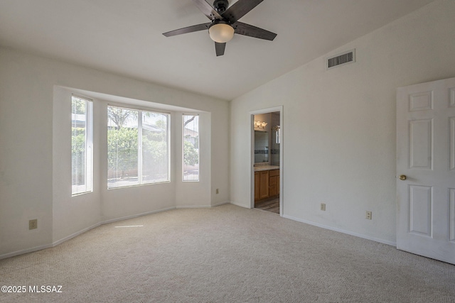 8954 E Pomegranate St, Tucson, AZ 85730 - unfurnished room with lofted ceiling, ceiling fan, and carpet