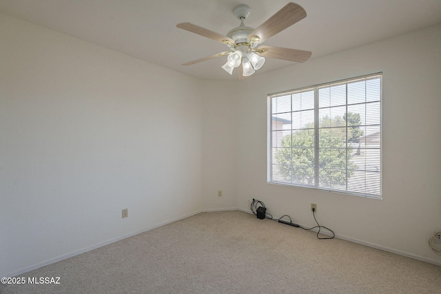 8954 E Pomegranate St, Tucson, AZ 85730 - empty room with light colored carpet and a ceiling fan