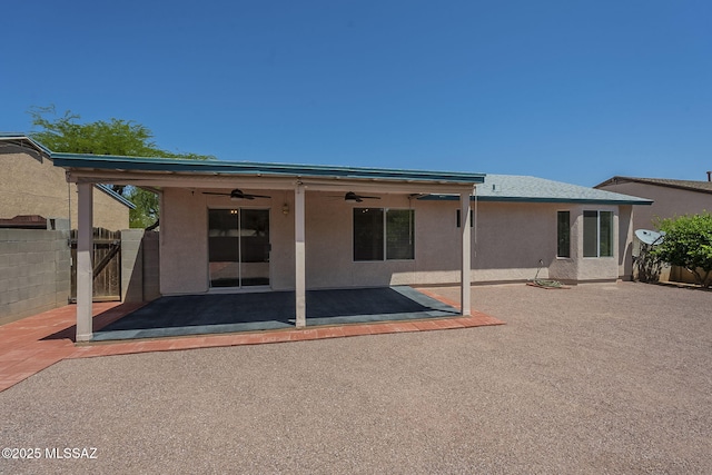 8954 E Pomegranate St, Tucson, AZ 85730 - rear view of house featuring ceiling fan, stucco siding, and a patio