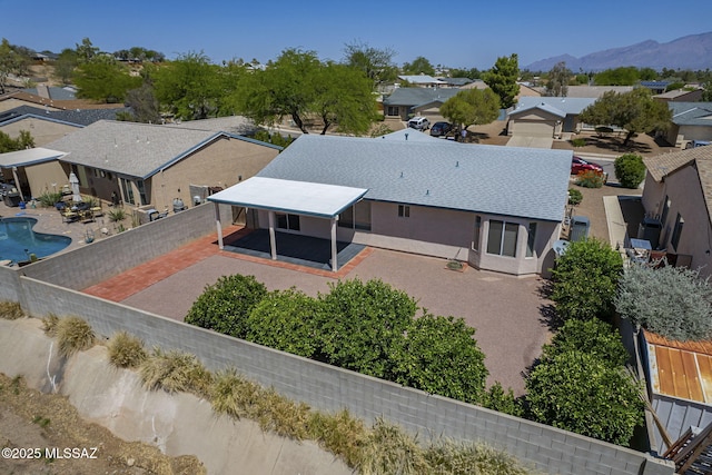 8954 E Pomegranate St, Tucson, AZ 85730 - aerial view of residential area with a mountain backdrop