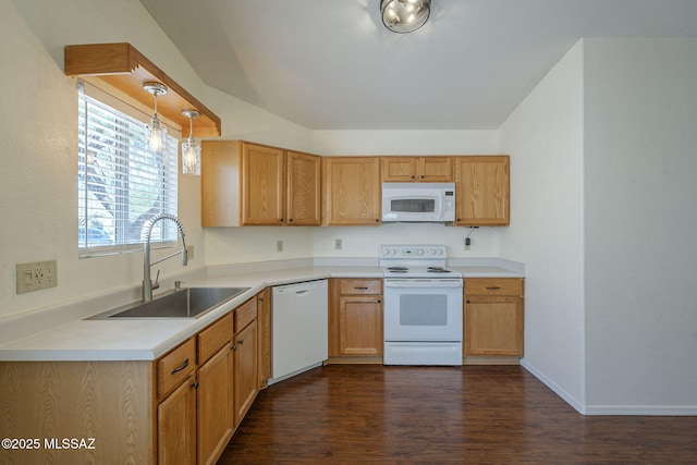 8954 E Pomegranate St, Tucson, AZ 85730 - kitchen with white appliances, dark wood finished floors, light countertops, and hanging light fixtures