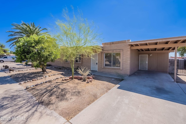 2340 S Window Rock Pl, Tucson, AZ 85710 - view of front of house with an attached carport and driveway