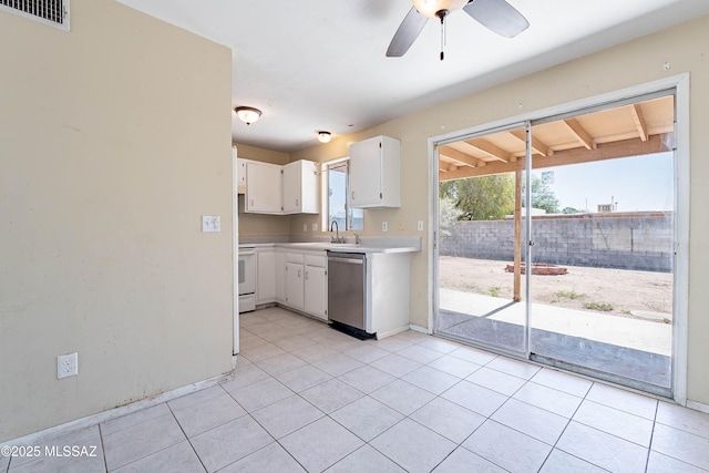 2340 S Window Rock Pl, Tucson, AZ 85710 - kitchen featuring stainless steel dishwasher, a sink, white electric range, light countertops, and white cabinetry