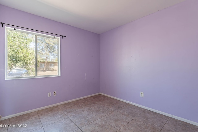 2340 S Window Rock Pl, Tucson, AZ 85710 - unfurnished room featuring baseboards and light tile patterned floors