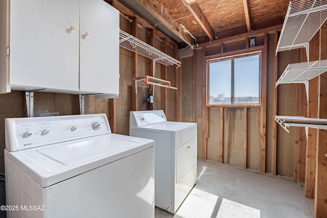 2340 S Window Rock Pl, Tucson, AZ 85710 - washroom with separate washer and dryer and cabinet space