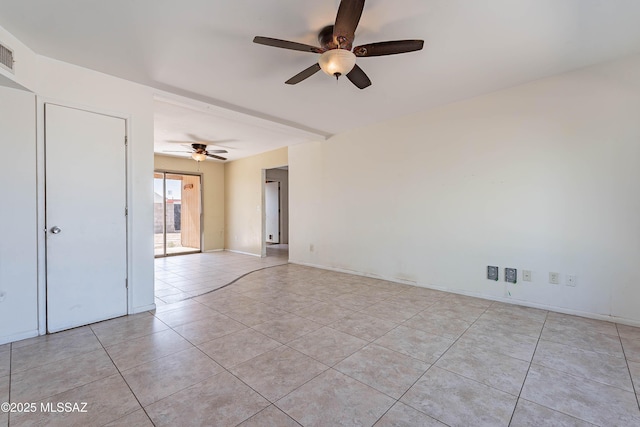 2340 S Window Rock Pl, Tucson, AZ 85710 - spare room featuring ceiling fan and light tile patterned floors