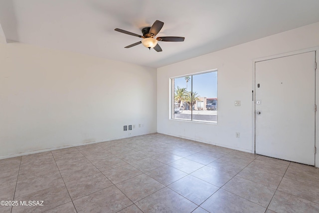 2340 S Window Rock Pl, Tucson, AZ 85710 - spare room with ceiling fan and light tile patterned flooring