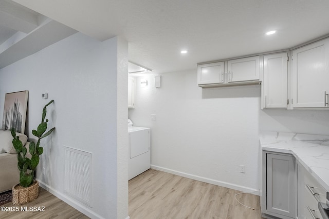 4203 N River Grove Cir Unit 103, Tucson, AZ 85719 - finished basement featuring washer / clothes dryer, light wood-style flooring, baseboards, and recessed lighting