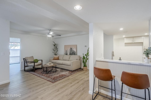 4203 N River Grove Cir Unit 103, Tucson, AZ 85719 - living area featuring light wood-style flooring, baseboards, a ceiling fan, and recessed lighting
