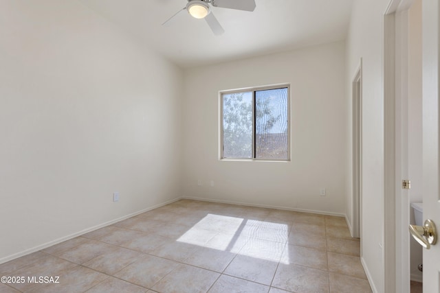 14243 E Whisper Trl, Vail, AZ 85641 - unfurnished bedroom featuring light tile patterned floors and a ceiling fan