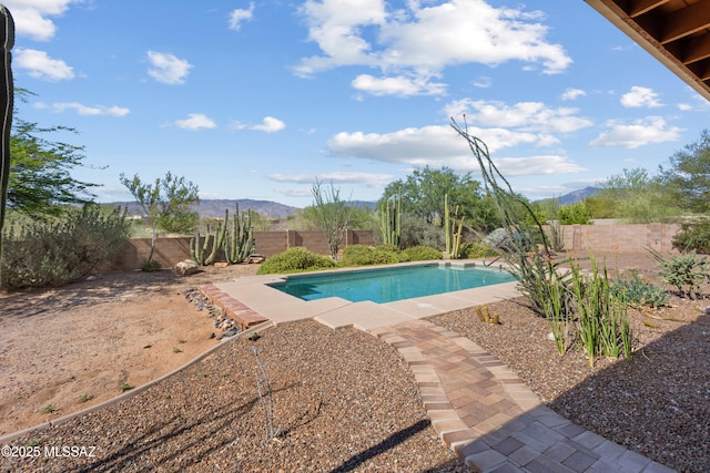 14243 E Whisper Trl, Vail, AZ 85641 - view of swimming pool with a fenced backyard, a mountain view, and a patio