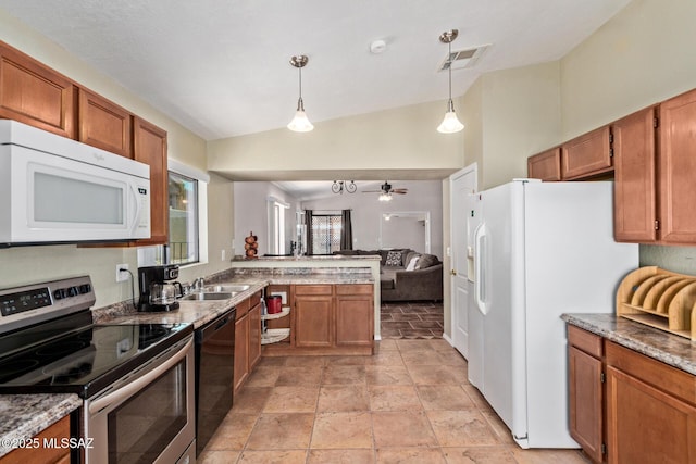 8172 N Streamside Ave, Tucson, AZ 85741 - kitchen with white appliances, open floor plan, a peninsula, a sink, and brown cabinets