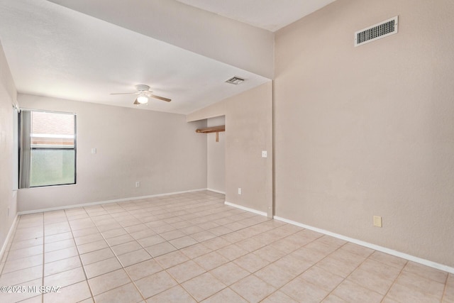 8172 N Streamside Ave, Tucson, AZ 85741 - empty room featuring ceiling fan, light tile patterned flooring, and baseboards
