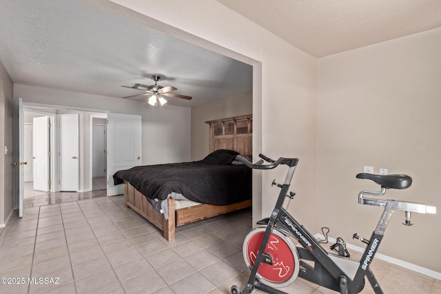 8172 N Streamside Ave, Tucson, AZ 85741 - bedroom featuring baseboards, light tile patterned floors, and ceiling fan