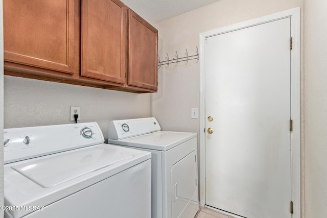 8172 N Streamside Ave, Tucson, AZ 85741 - washroom featuring washer and clothes dryer and cabinet space