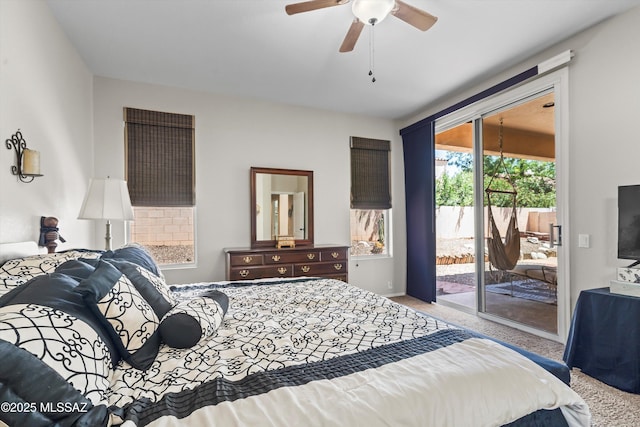 9860 N Western Sky Pl, Tucson, AZ 85742 - bedroom with carpet floors, access to outside, and ceiling fan