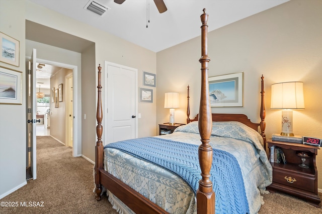 9860 N Western Sky Pl, Tucson, AZ 85742 - carpeted bedroom with baseboards and a ceiling fan