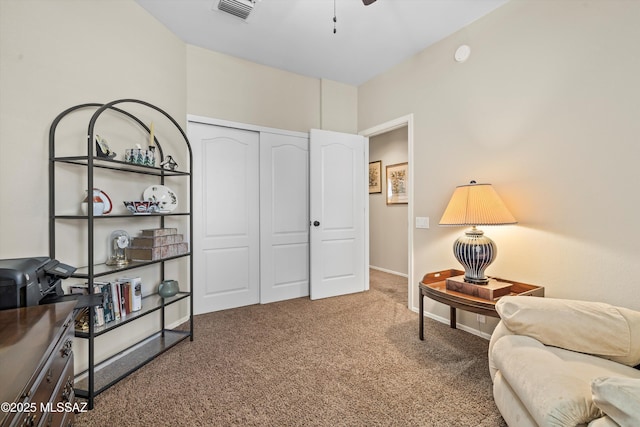 9860 N Western Sky Pl, Tucson, AZ 85742 - sitting room featuring carpet floors, a ceiling fan, and baseboards