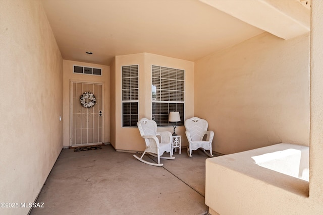 9860 N Western Sky Pl, Tucson, AZ 85742 - entrance to property with stucco siding and a patio