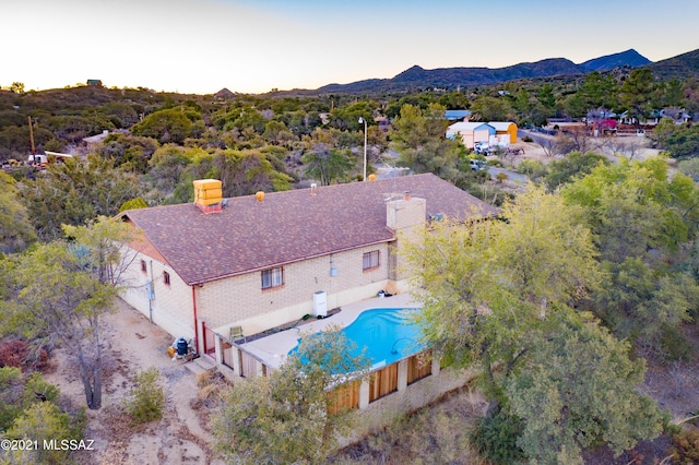 150 E Nuestro St, Oracle, AZ 85623 - aerial view at dusk of view of pool and a mountain view