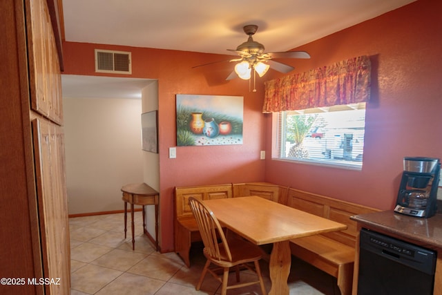 1117 S Carnegie Dr, Tucson, AZ 85710 - dining area with ceiling fan, light tile patterned floors, and breakfast area