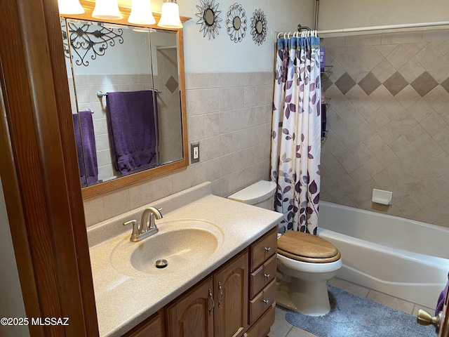 1117 S Carnegie Dr, Tucson, AZ 85710 - bathroom featuring tile walls, vanity, shower / bath combination with curtain, and tile patterned floors