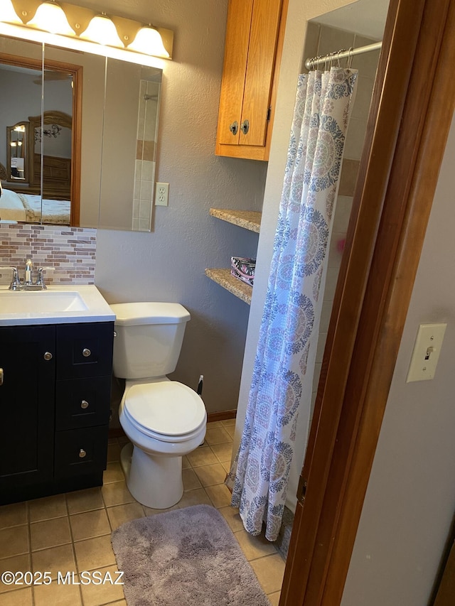 1117 S Carnegie Dr, Tucson, AZ 85710 - bathroom featuring vanity, tile patterned floors, tasteful backsplash, and a shower with shower curtain