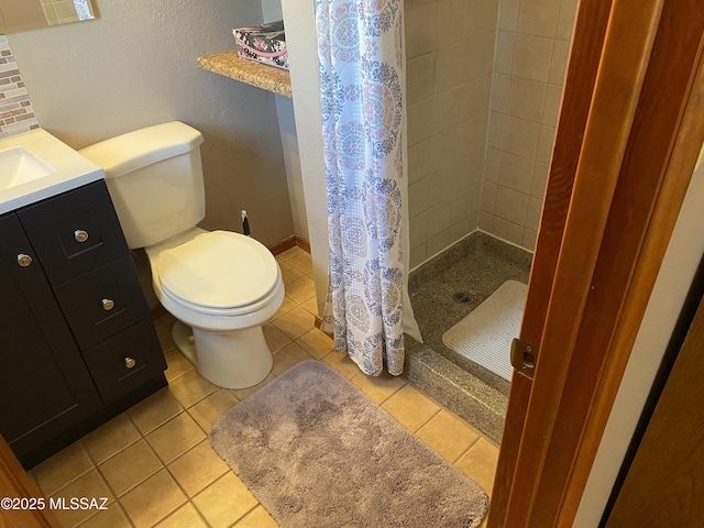 1117 S Carnegie Dr, Tucson, AZ 85710 - bathroom featuring a stall shower, vanity, a textured wall, and tile patterned floors