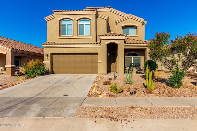 6733 S Stone Fly Dr, Tucson, AZ 85757 - view of front of property with stucco siding, a garage, driveway, and a tiled roof
