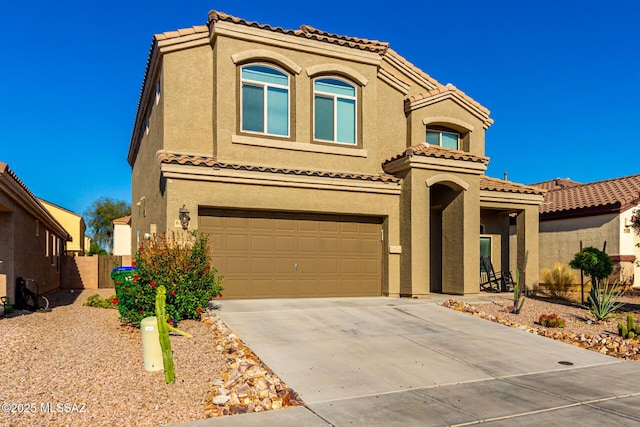 6733 S Stone Fly Dr, Tucson, AZ 85757 - view of front of property featuring a garage, stucco siding, a tiled roof, and concrete driveway