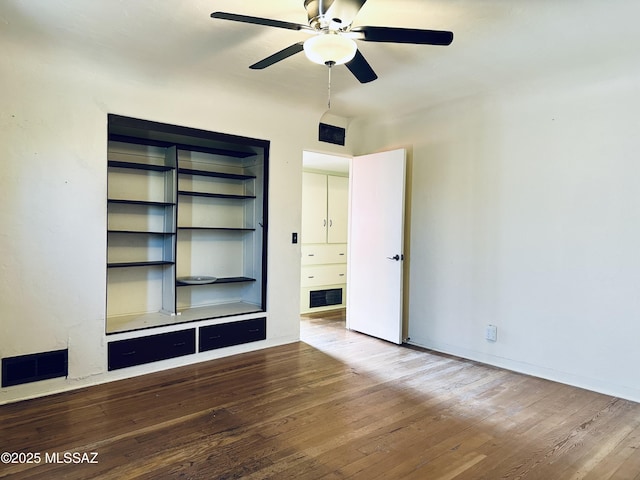 41 S Main St, Pima, AZ 85543 - empty room with wood finished floors, a ceiling fan, and baseboards