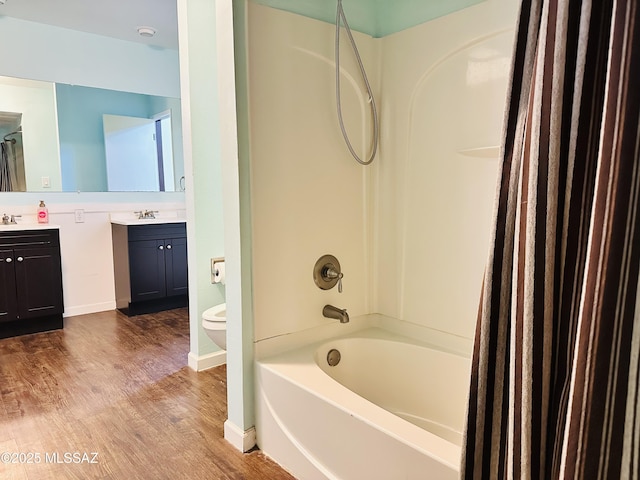 41 S Main St, Pima, AZ 85543 - bathroom featuring vanity, wood finished floors, toilet, and shower / bath combo