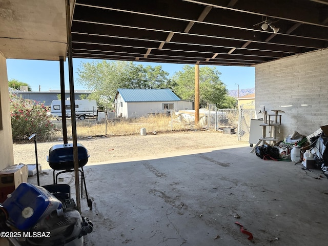 41 S Main St, Pima, AZ 85543 - view of patio featuring grilling area and an outbuilding
