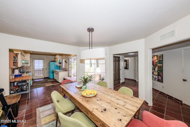 2600 E Skyline Dr Unit 21, Tucson, AZ 85718 - dining room featuring tile patterned flooring